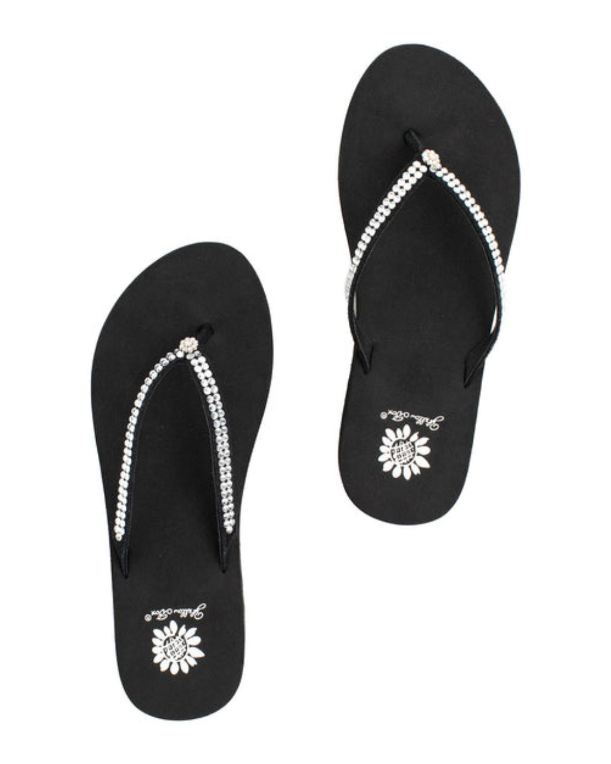 Top view of a pair black wedge sandals with rhinestones on the strap on a white backdrop. The sandal has 1.75" heel height and 0.75" platform height.