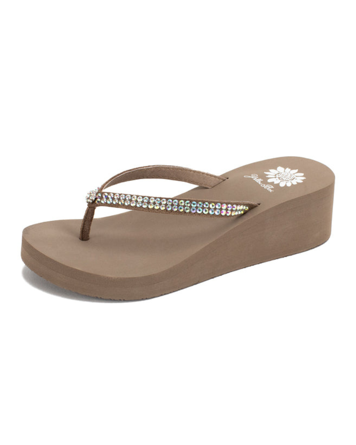 Front side view of a taupe wedge sandal with rhinestones on the strap on a white backdrop. The sandal has 1.75" heel height and 0.75" platform height.