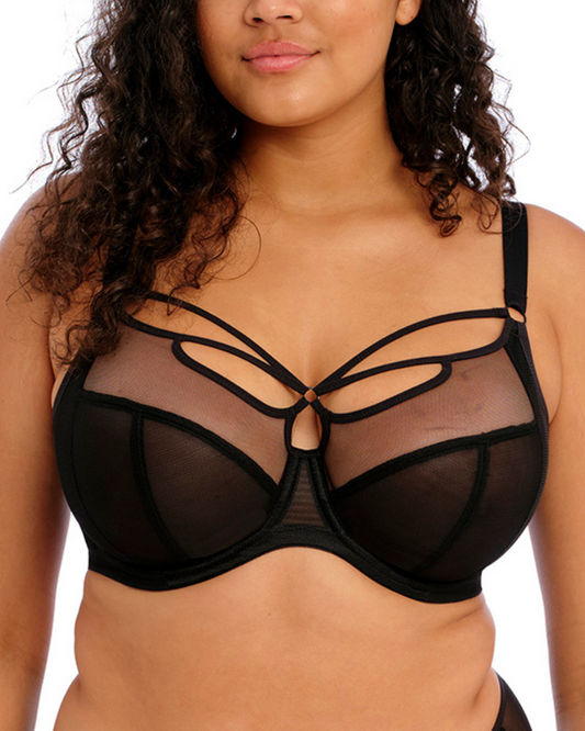 Model wearing a strappy underwire plunge bra in black