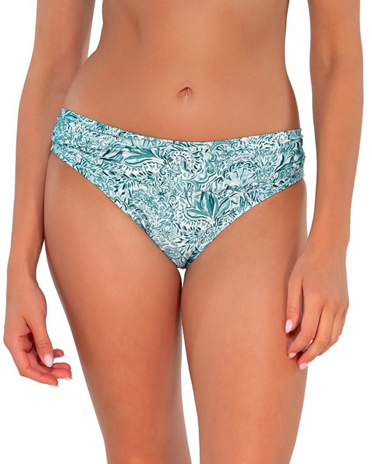 Model wearing a hipster brief bottom in a pale turquoise, white and navy paisley print