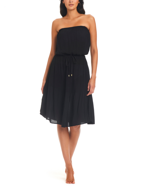 Model wearing a strapless blouson dress in black