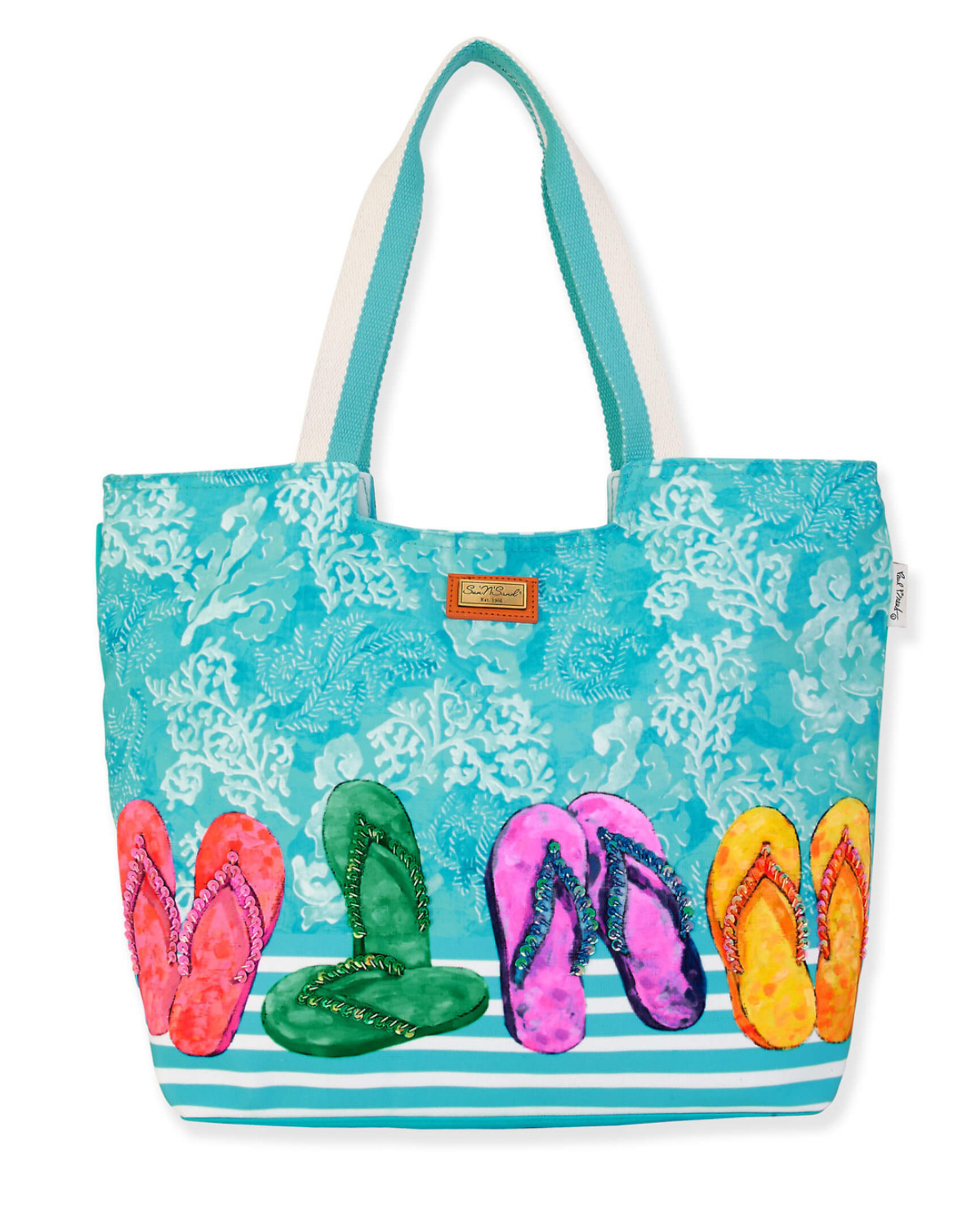 Blue tote bang with a sketch drawing of multicolored flip flops in red, green, pink and yellow with coral design in the background