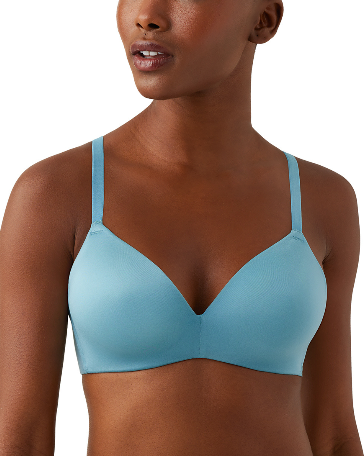 Model wearing a wire free molded bra in light blue