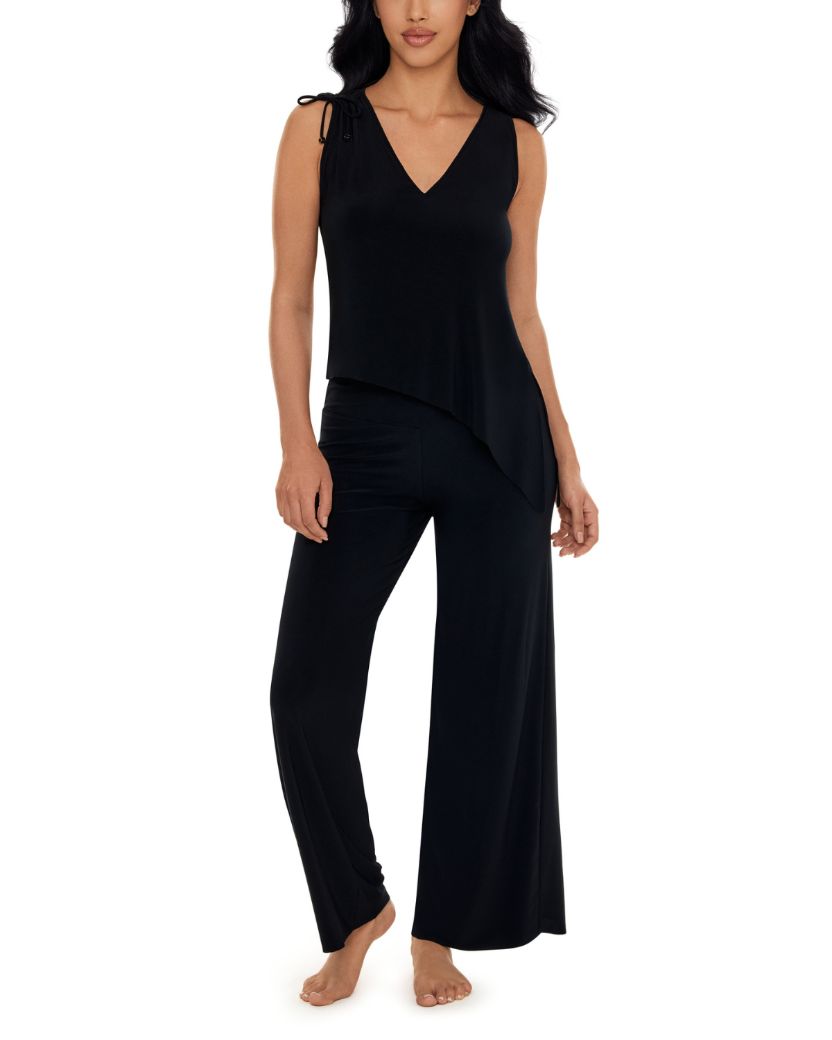 Model wearing a wide leg cover up pant in black