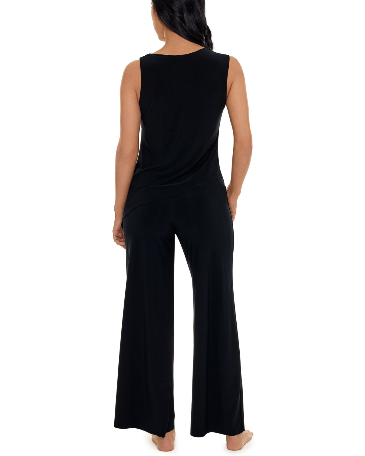 Model wearing a wide leg cover up pant in black