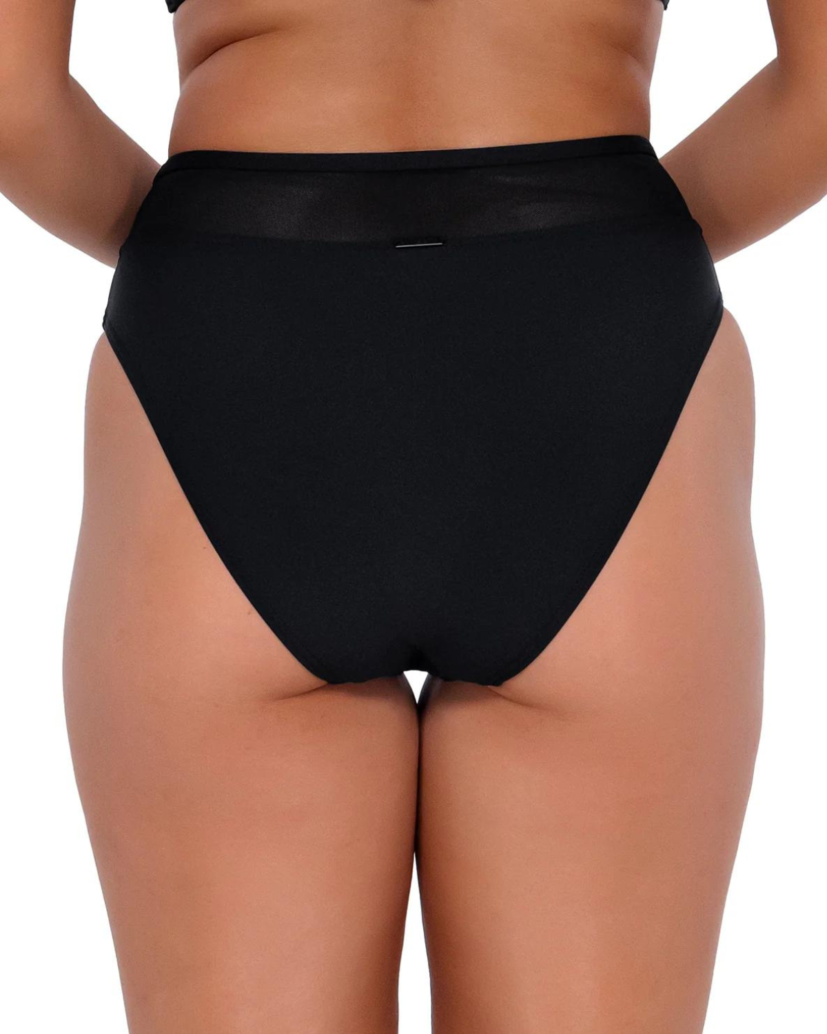 Model wearing high waist high leg brief bottom in black.
