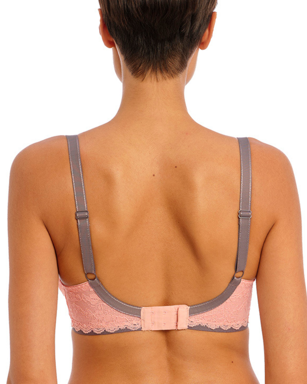 Model wearing a padded half cup underwire bra in pink