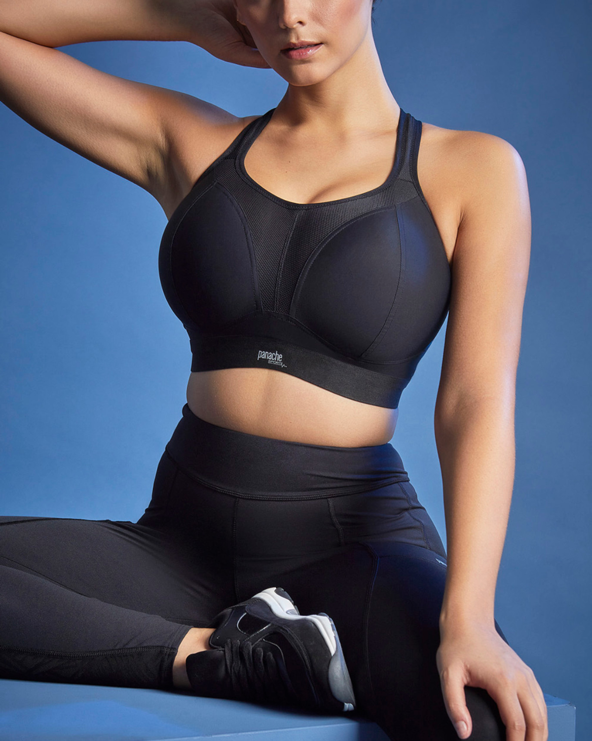 Model wearing a wire free sports bra in black