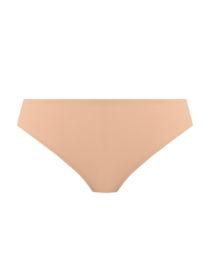 Flat lay of a seamless thong in beige/ nude