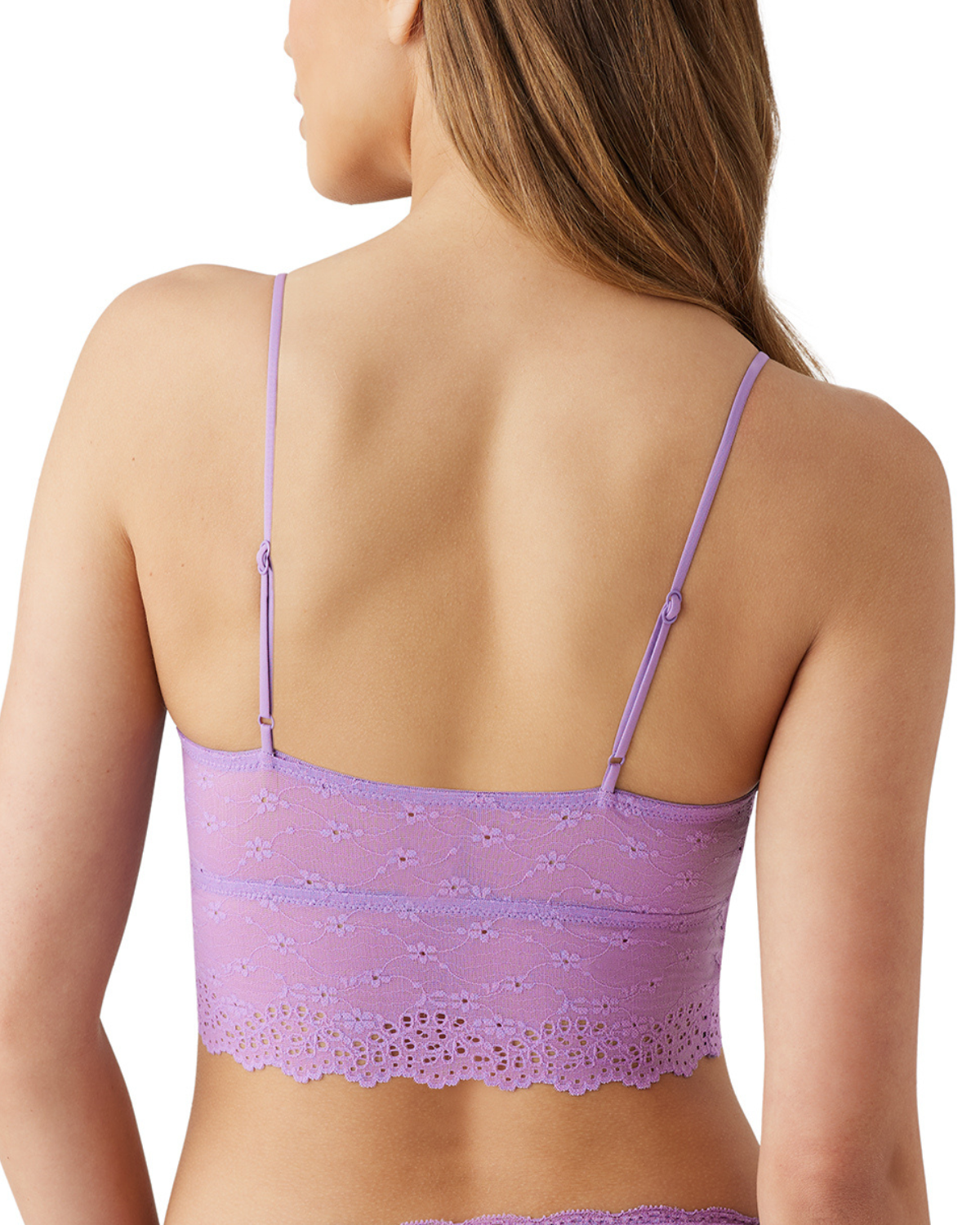 Model wearing a lace bralette in purple