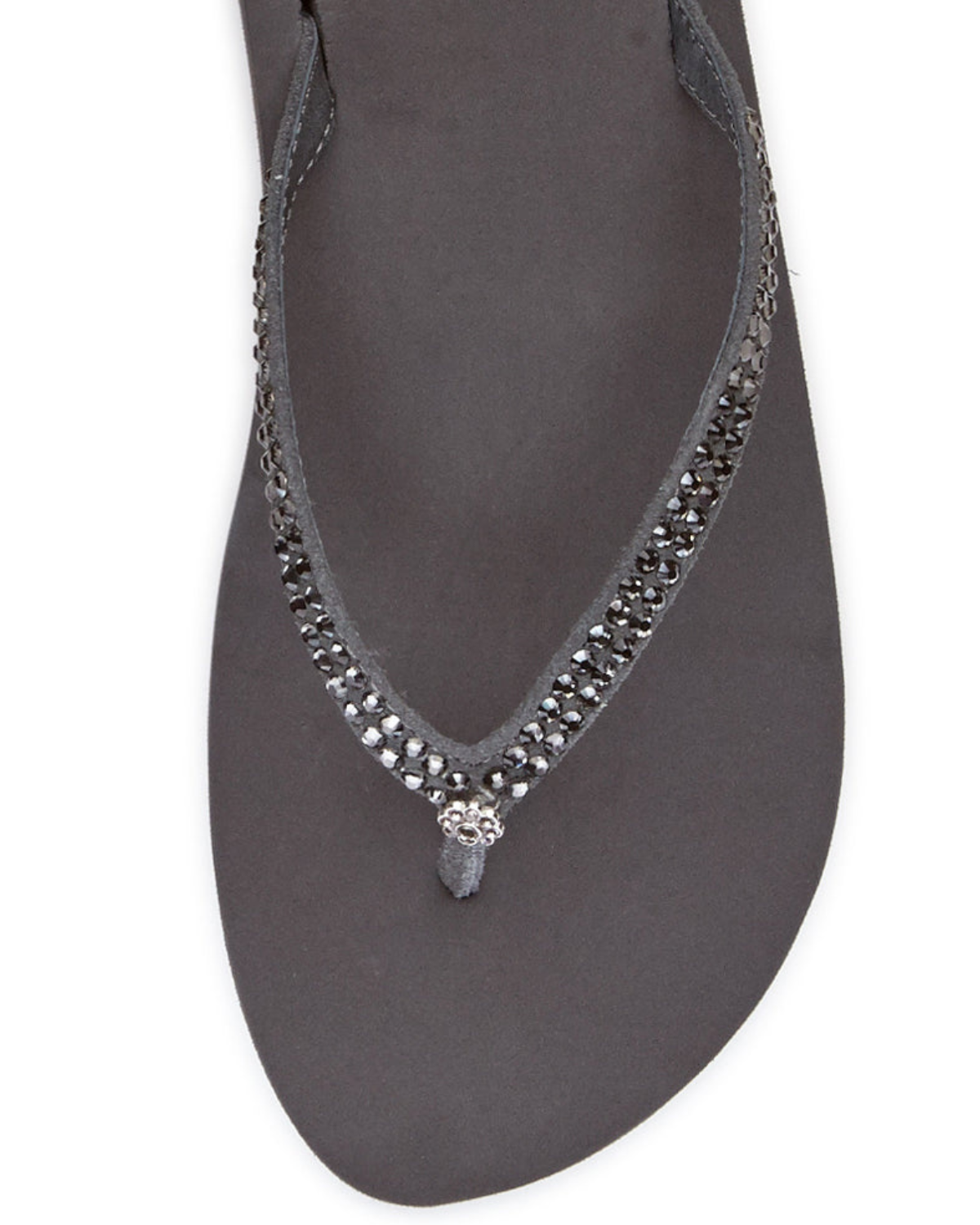 Women's grey wedge sandal with black rhinestones on the strap.