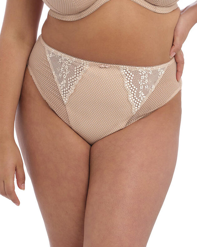 Model wearing a hi cut full brief panty in beige/ nude