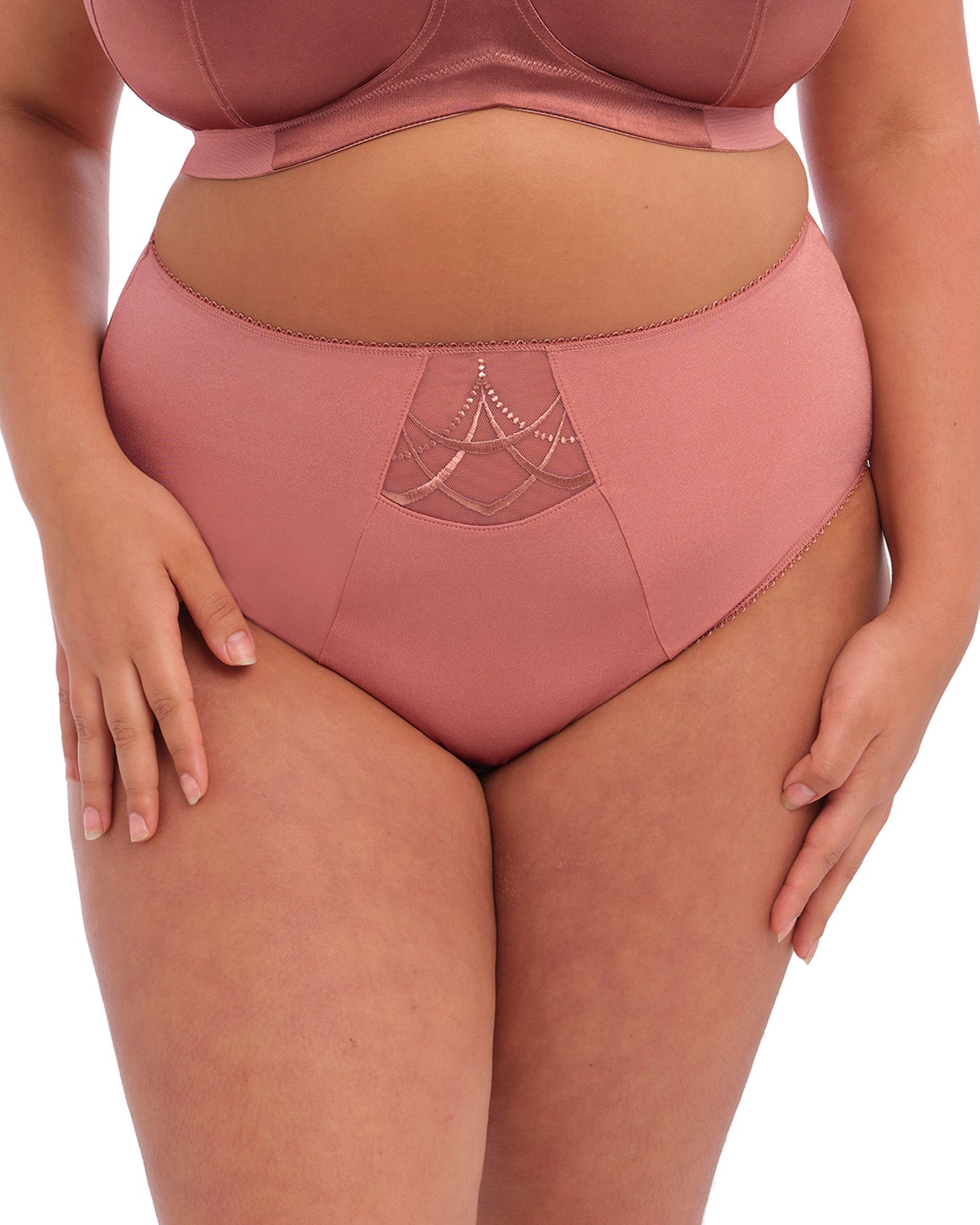 Model wearing a full brief panty in rose pink
