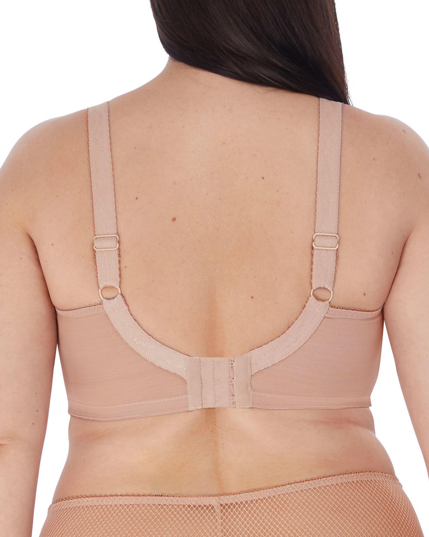 Model wearing a molded underwire t-shirt bra in nude/  beige.