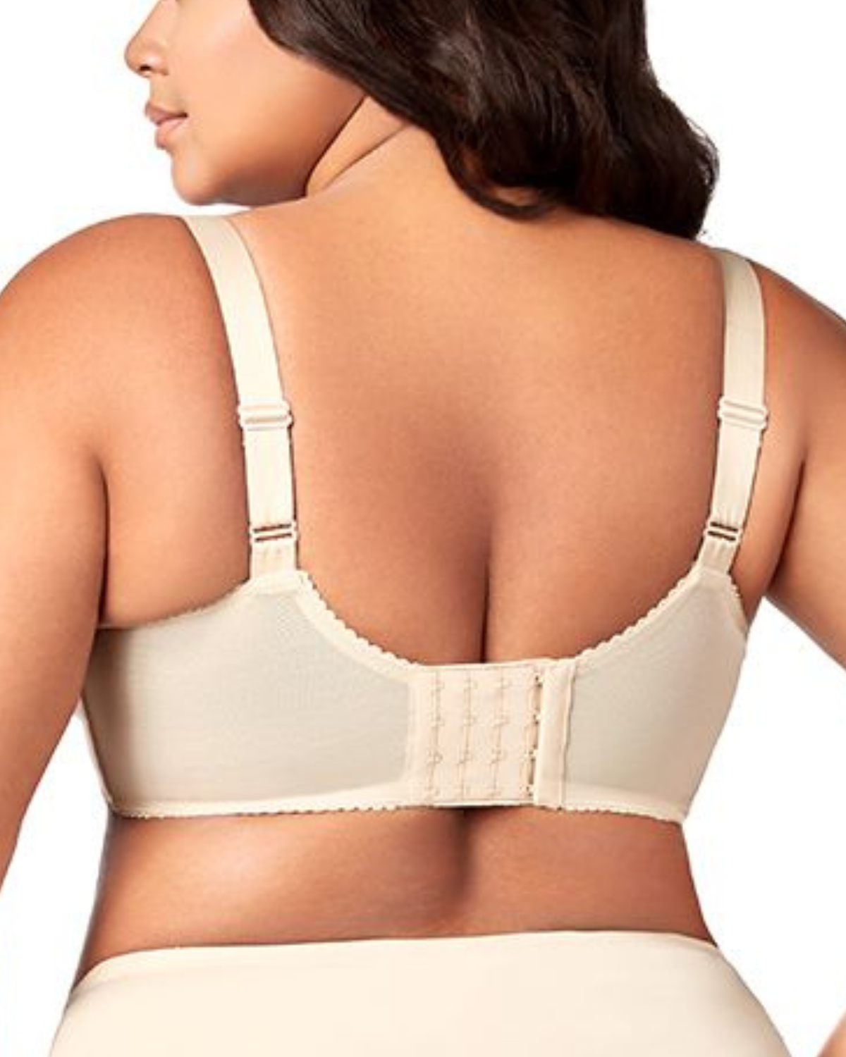 Model wearing a wire free cut and sew bra with lace in nude