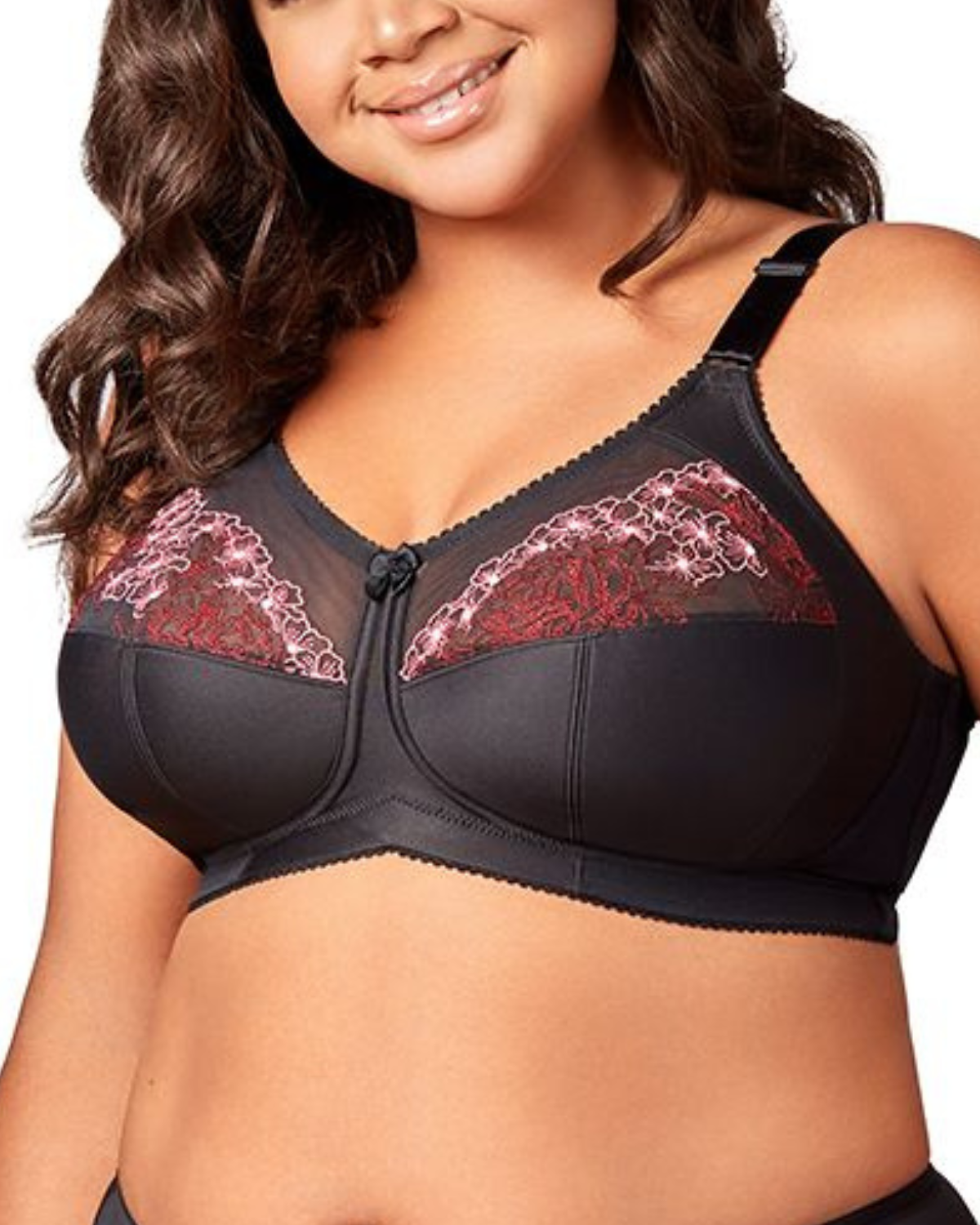 Model wearing a wire free cut and sew bra with lace in black