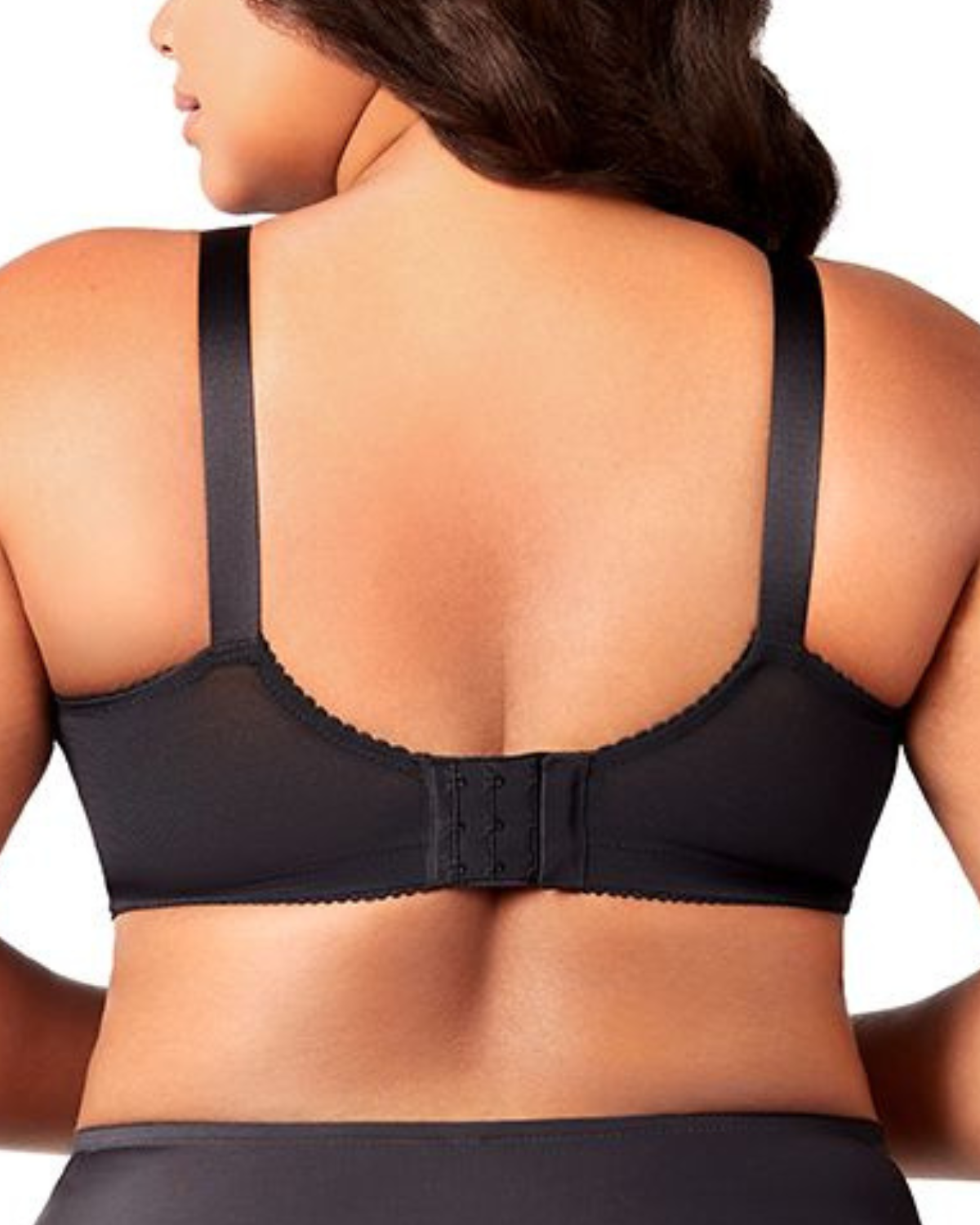 Model wearing a wire free cut and sew bra with lace in black
