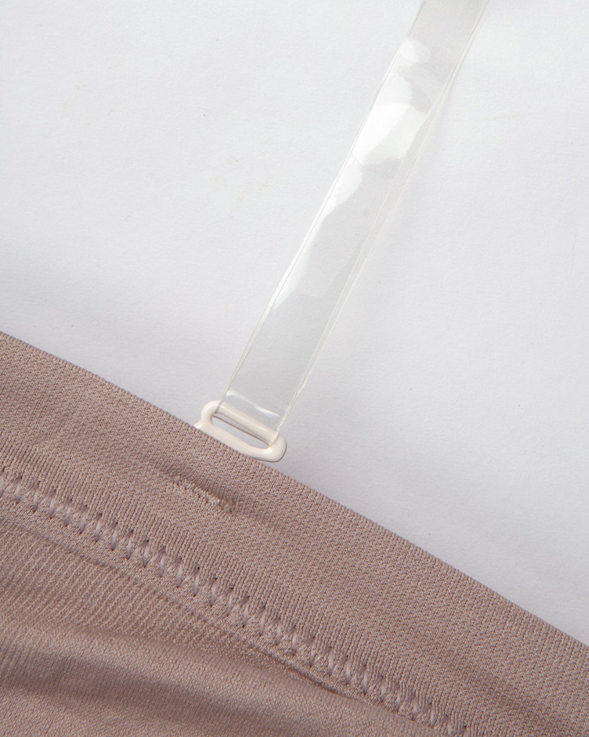 Model wearing a clear strap attachment.