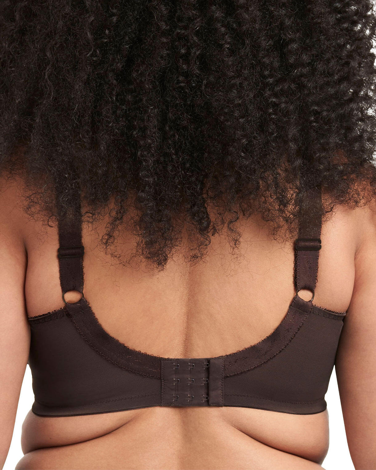 Model wearing a cut and sew underwire banded bra in chocolate brown