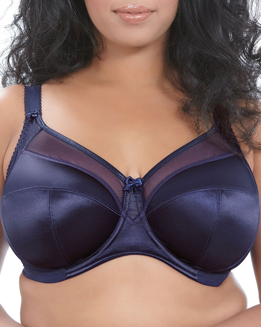 Model wearing a cut and sew underwire banded bra in navy blue