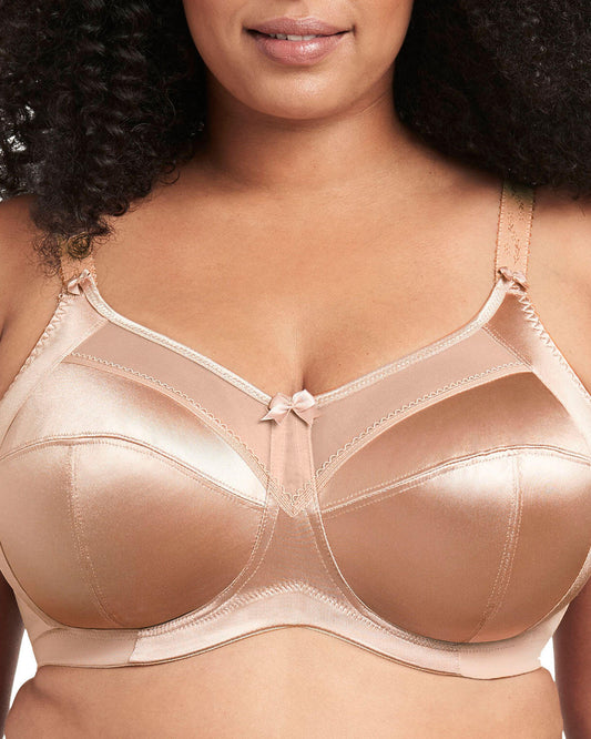 Model wearing a soft cup wire free bra in light beige