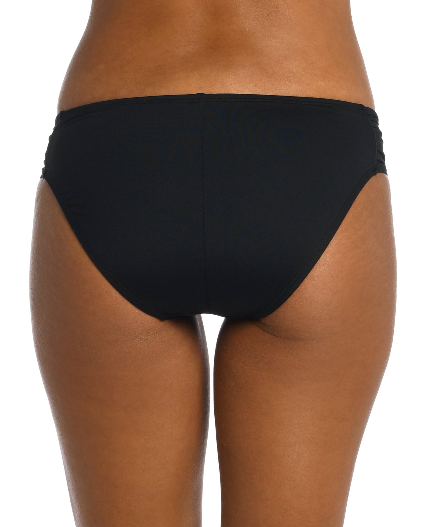 Model wearing a side shirred hipster bikini bottom in black