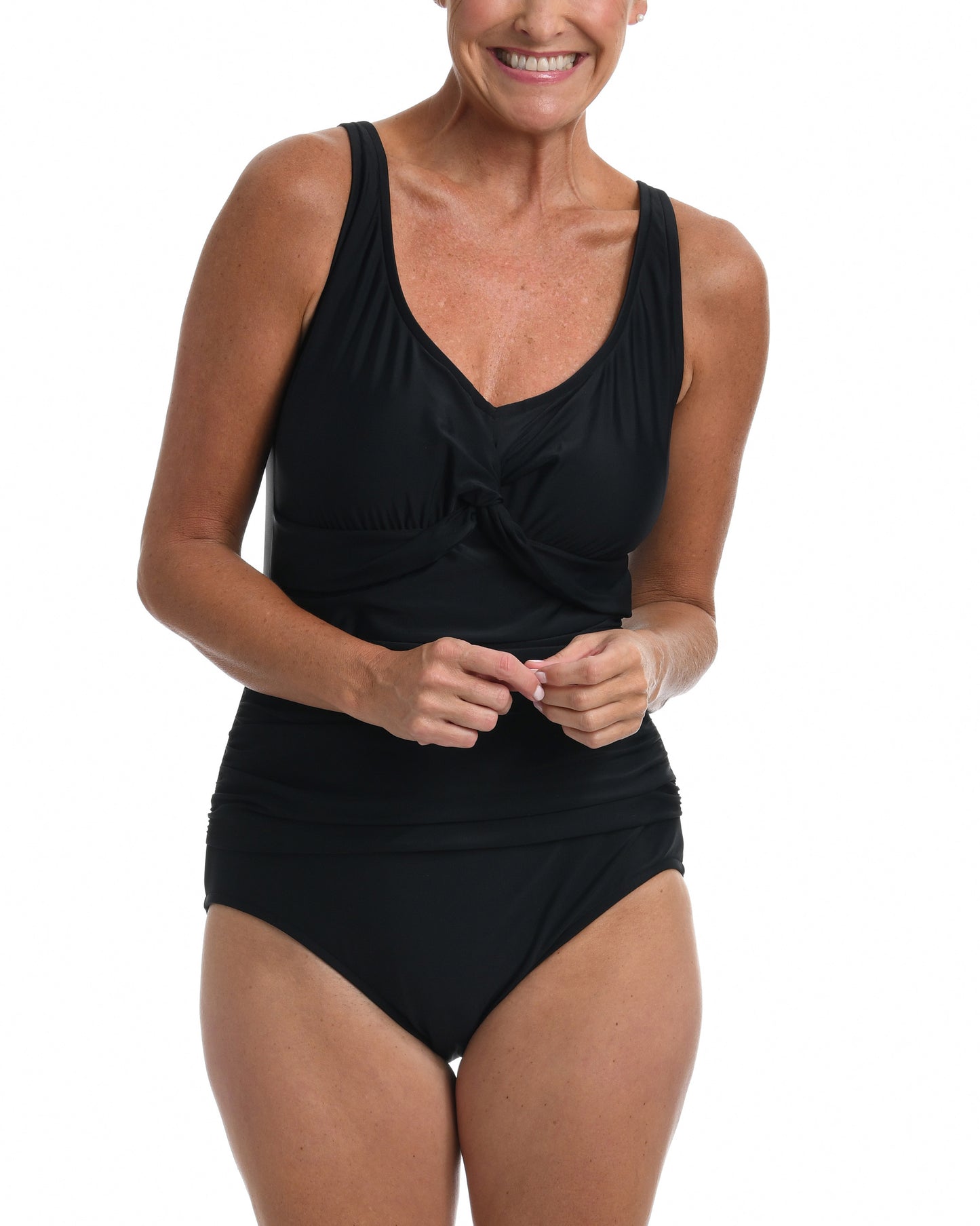 Model wearing a one piece swimsuit with a twist front detail in black