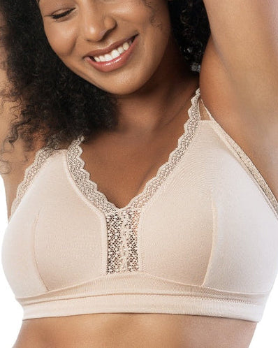 Model wearing a wire free bralette in beige nude.