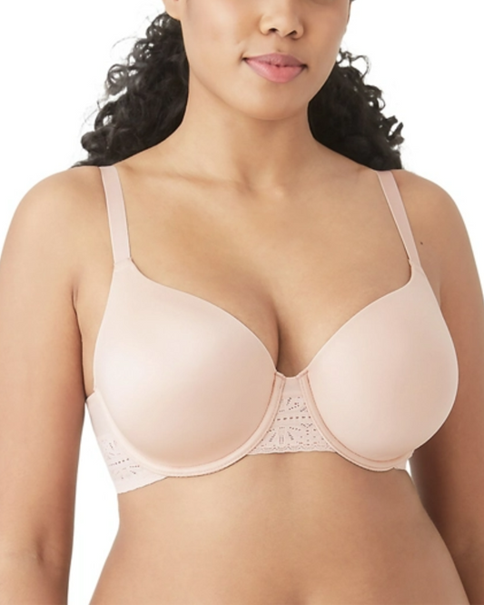 Model wearing a molded underwire t-shirt bra with lace on the wings in light pink