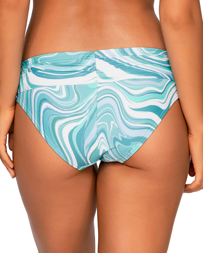 Model wearing a hipster bottom in a pale turquoise and white swirl print.