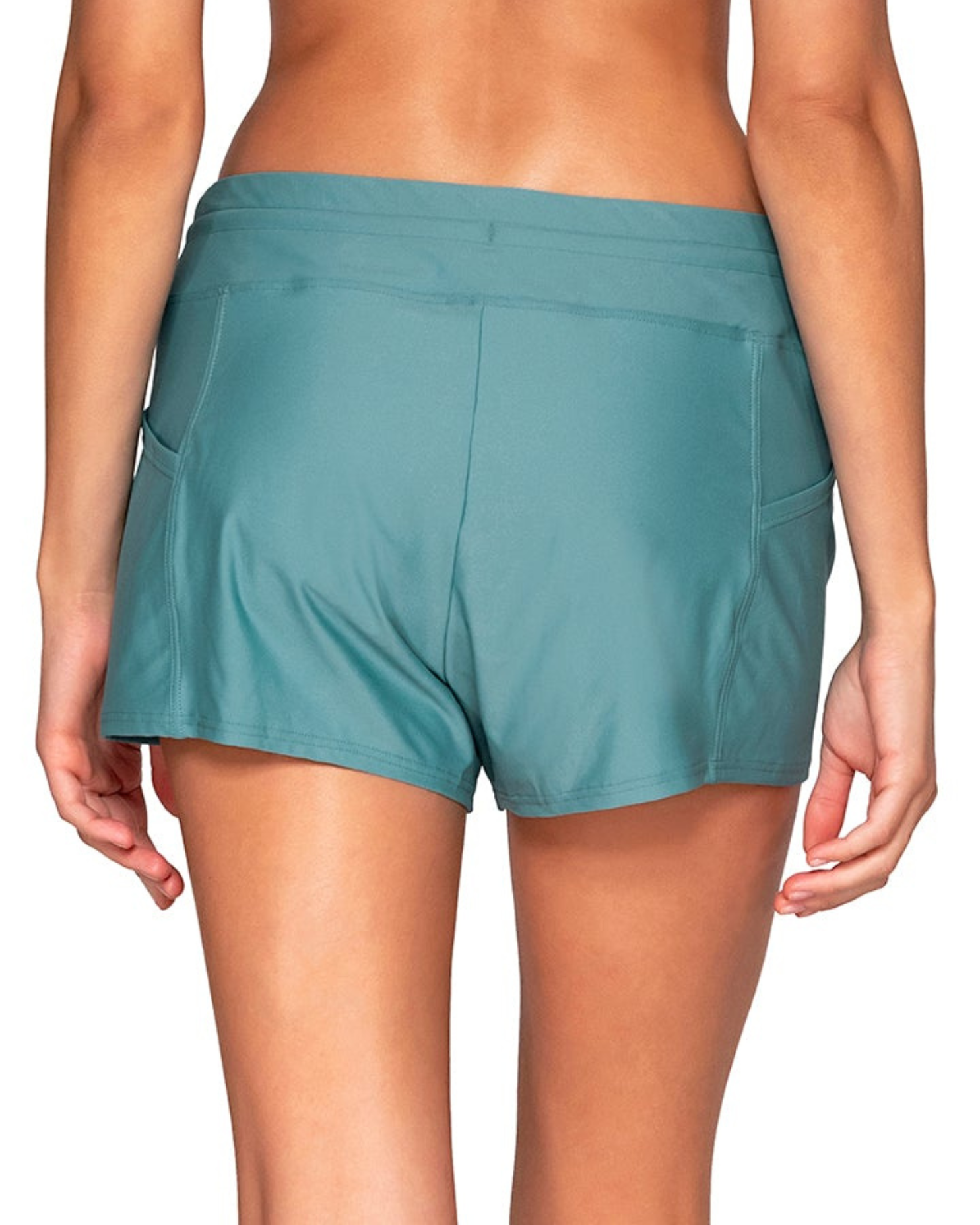 Model wearing a swim short with side pocket in pale turquoise