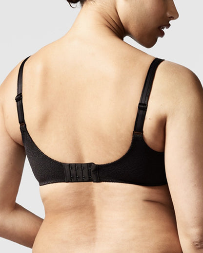 Model wearing a soft cup underwire bra in black