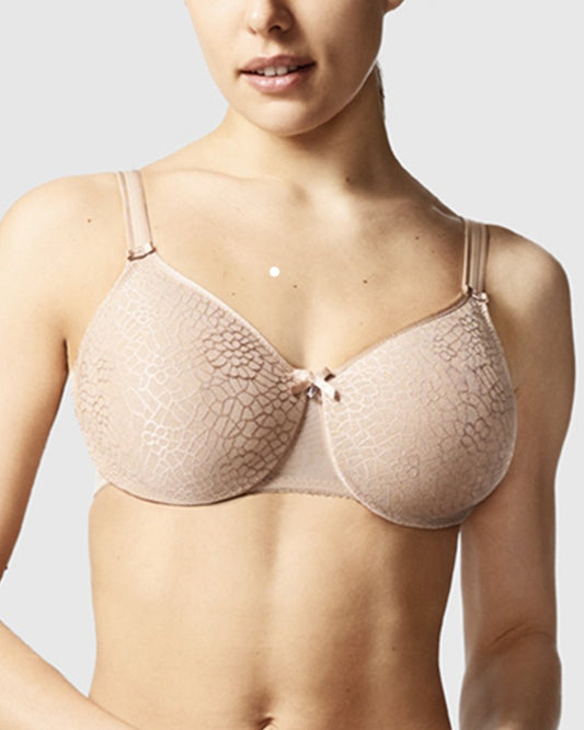 Model wearing a soft cup underwire bra in nude