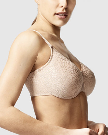 Model wearing a soft cup underwire bra in nude