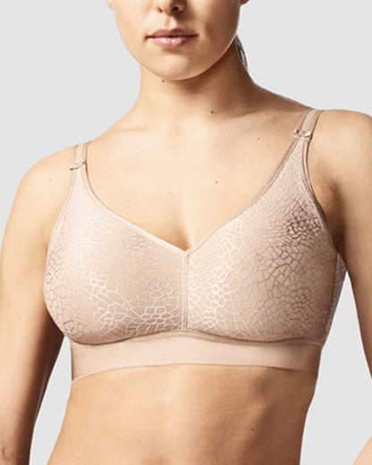 Model wearing a wire free bra in nude