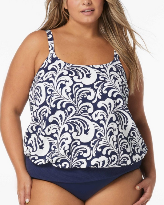 Model wearing a blouson tankini top in a navy and white scroll print