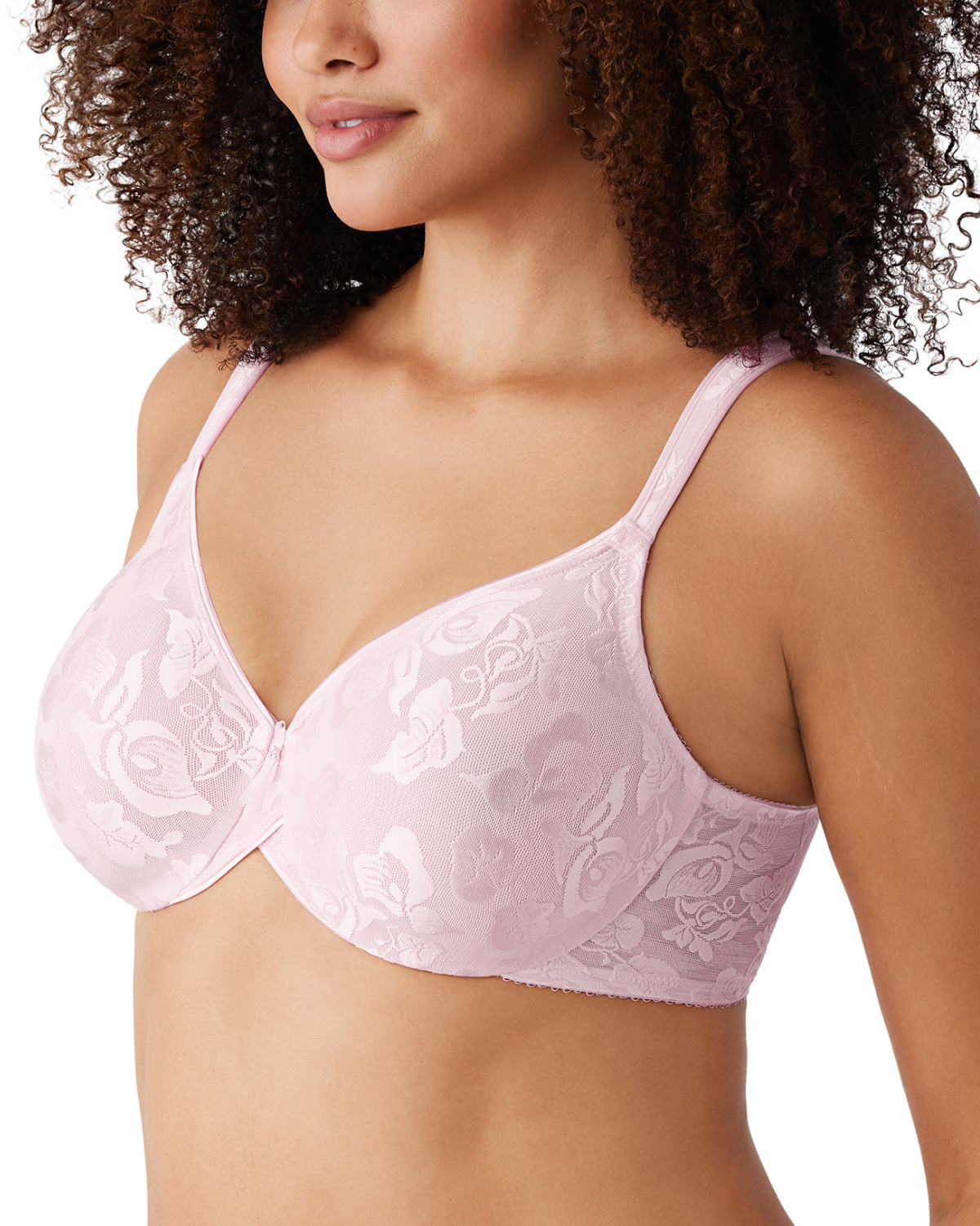 Model wearing a soft cup underwire bra in light pink