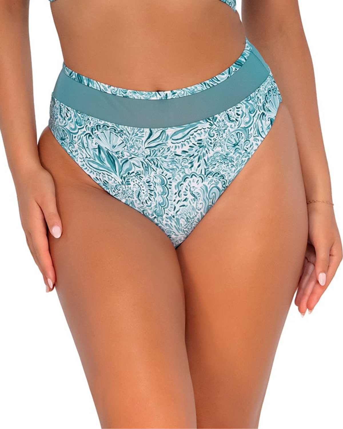 Model wearing a high waist high leg brief bottom in a pale turquoise, white and navy paisley print.