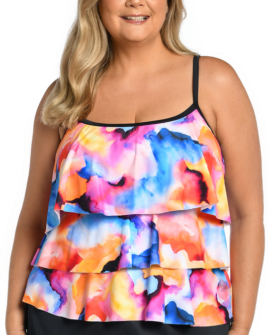 Plus size model wearing a triple tiered tankini top in a multi colored watercolor style print