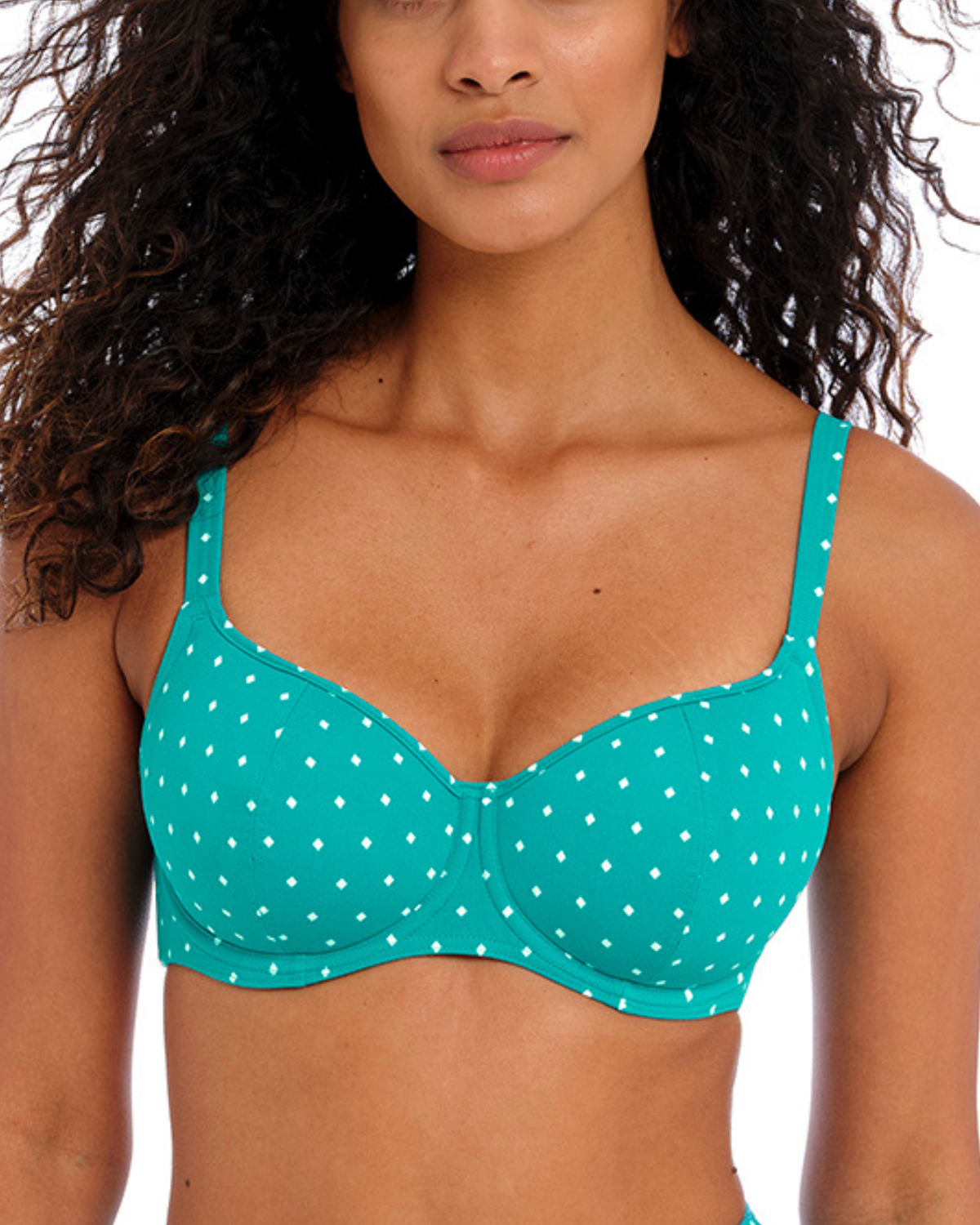 Model wearing a underwire sweetheart bikini top in a white dot and turquoise base print