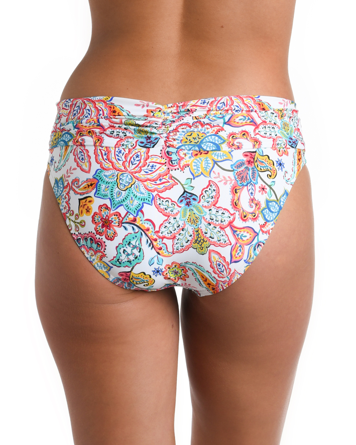 Model wearing a shirred band hipster bottom in a white multicolored gypsy floral print