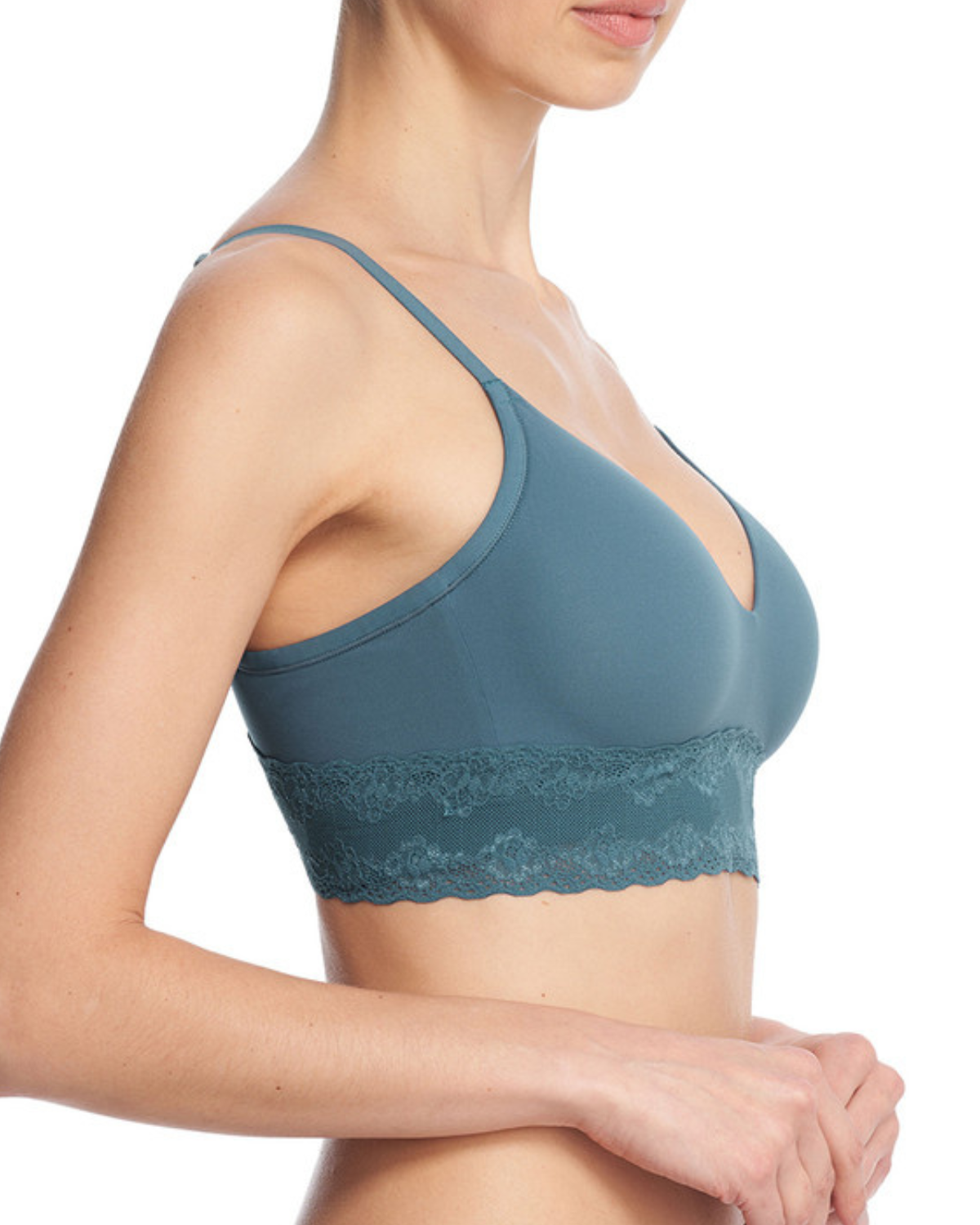 Model wearing a wire free t-shirt bra with a lace band in  blue
