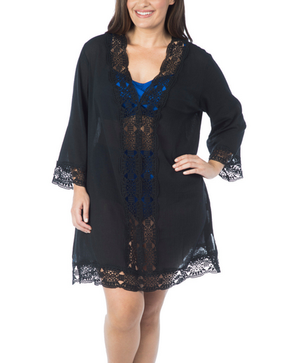 Model wearing a v-neck tunic with a 3/4 sleeve with crochet trimmings in black