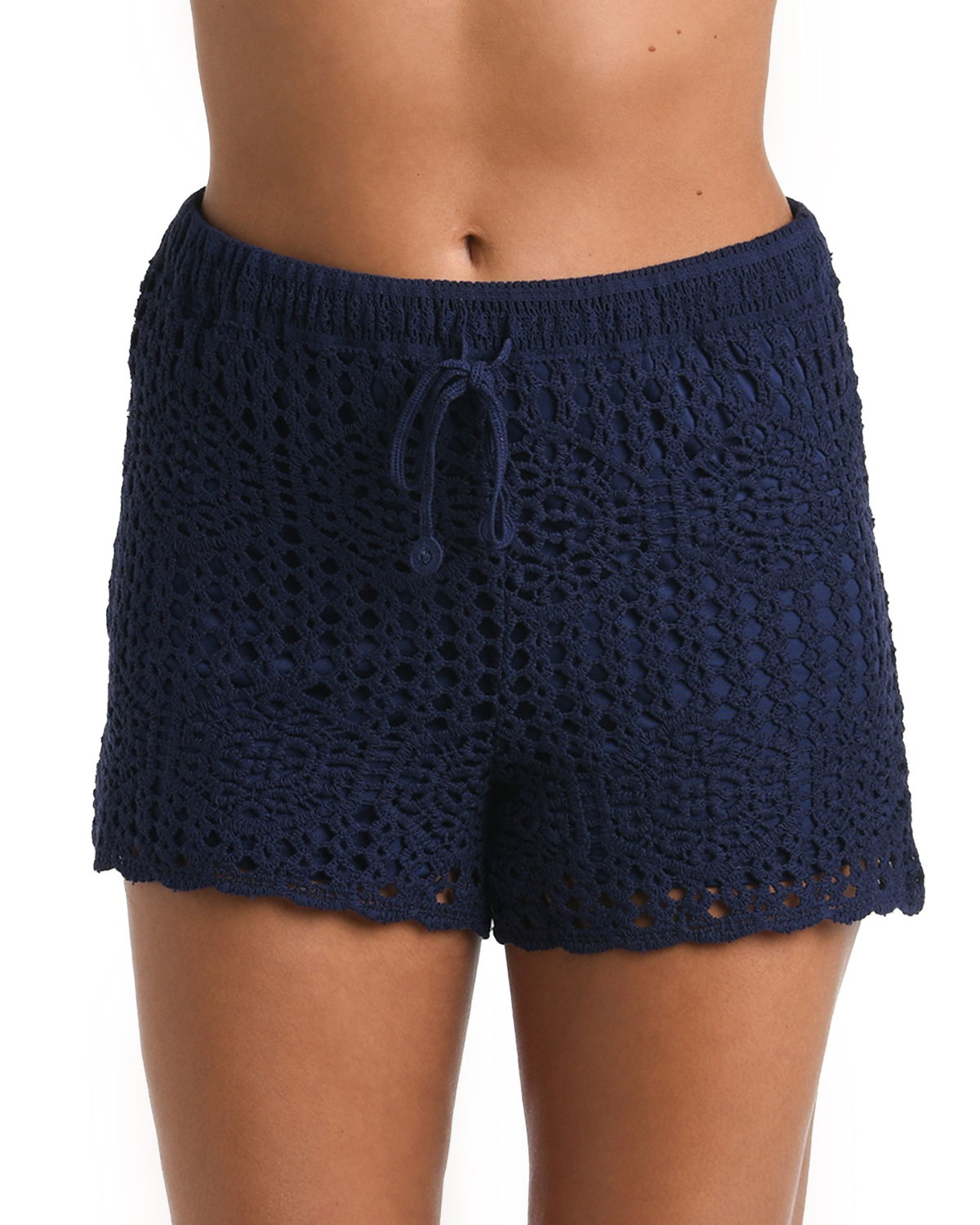 Model wearing a crochet short in indigo