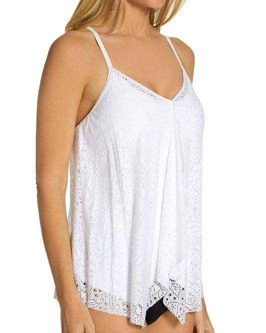 Model wearing a layered crochet tankini top in white