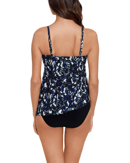 Model wearing tankini top with adjustable straps in an abstract navy, black and white print
