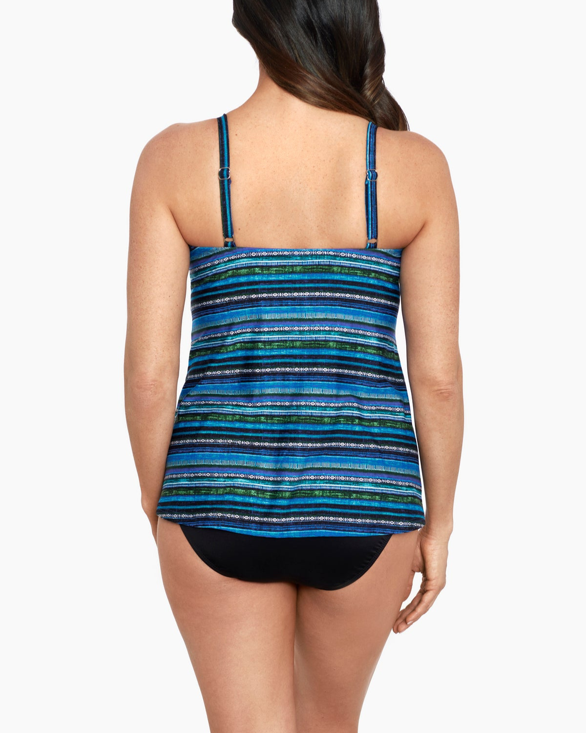 Model wearing a striped tankini top in multiple shades of blue