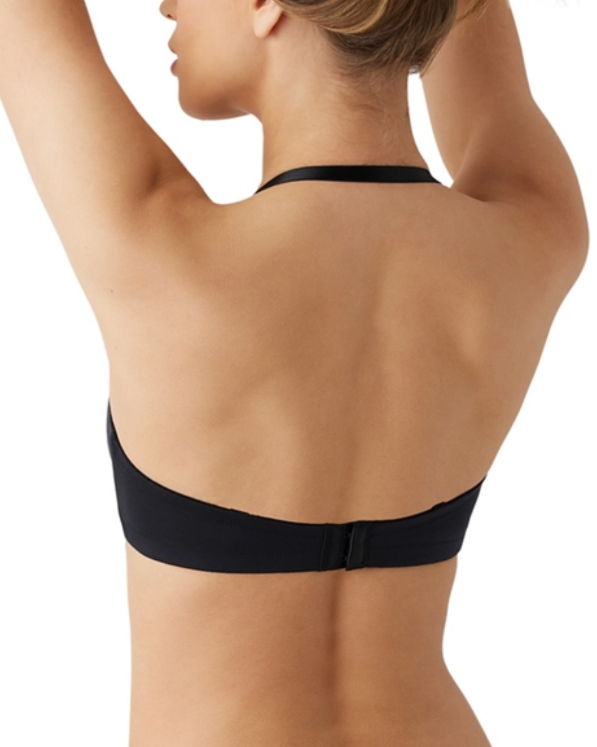 Model wearing a molded wire-free strapless bra in black with detachable straps to wear multiple ways in black