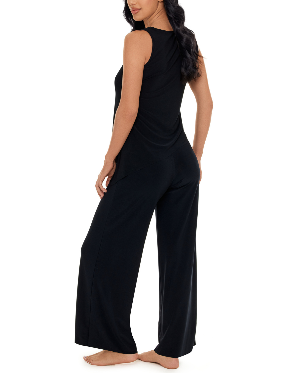 Model wearing a wide leg cover up pant in black
