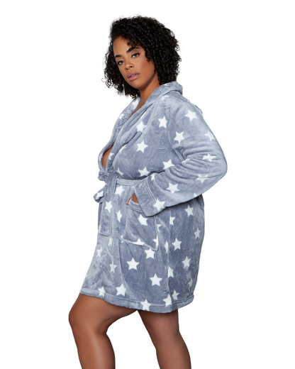 Model wearing a knee length plush robe in grey with white stars
